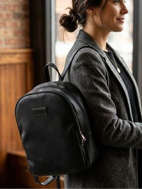 Benoss Milan Textured Faux Black Leather Multi Pocketed Travel Bag.